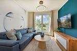 Wohnzimmer - Ferienwohnung Goldfisch mit Balkon, Wellness- und Kinderspielbereich - Top-Hundeurlaub