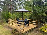 Sitzplatz im Grünen beim Hus Västerlyckan nahe dem Västersjön - Västerlyckan - Top-Hundeurlaub