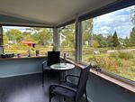 Wintergarten mit Blick in den Garten von Västerlyckan - Västerlyckan - Top-Hundeurlaub