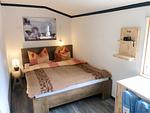 Schlafzimmer mit Doppelbett im Ferienhaus Hus Älmtamåla - Hus Älmtamåla - Top-Hundeurlaub