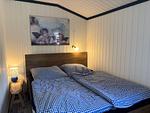 Schlafzimmer im Hus Älmtamåla mit Doppelbett 160 x 200 cm - Hus Älmtamåla - Top-Hundeurlaub