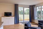 Wohnzimmer mit Zugang zur Terrasse - Wohnung 01 - Top-Hundeurlaub