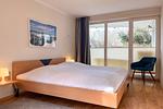 Schlafzimmer mit Doppelbett - Wohnung 01 - Top-Hundeurlaub