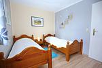 Schlafzimmer mit Einzelbetten - Wohnung 18-4 - Top-Hundeurlaub