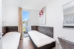 1. Schlafzimmer mit Einzelbetten - Promenadenvilla 23 Wohnung 07 - Top-Hundeurlaub