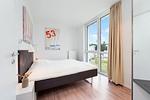 2. Schlafzimmer mit Doppelbett - Promenadenvilla 23 Wohnung 07 - Top-Hundeurlaub