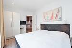 2. Schlafzimmer mit TV und Kleiderschrank - Promenadenvilla 23 Wohnung 07 - Top-Hundeurlaub