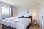 Schlafzimmer - Haus Weissenburg Whg. EG West - Top-Hundeurlaub