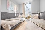 Schlafzimmer - Ferienwohnung Stranddistel Priwall Travemünde - Top-Hundeurlaub