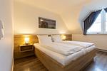 Schlafzimmer - Cuxlandhotel  Doppelzimmer 115 - Top-Hundeurlaub