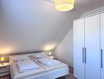 Schlafzimmer - Charmantes Ferienapartment mit Kamin - Top-Hundeurlaub