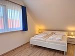 Schlafzimmer - Charmantes Ferienapartment mit Kamin - Top-Hundeurlaub