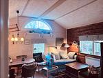 Wohnbereich mit Kamin im Ferienhaus Hus Flåten bei Järnforsen - Hus Flåten - Top-Hundeurlaub