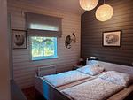Gemütliches Schlafzimmer im Hus Flåten bei Järnforsen - Hus Flåten - Top-Hundeurlaub