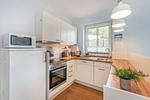 Küche / Küchenzeile - Ferienhaus Waldhaus 5 mit Sauna und Terrasse mit Grill - Top-Hundeurlaub