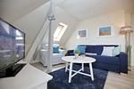 Wohnzimmer mit Schlafcouch - Wohnung 06 - Top-Hundeurlaub