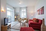 Wohnzimmer mit Schlafcouch - Wohnung 02 - Top-Hundeurlaub