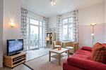 Wohnzimmer mit TV - Wohnung 02 - Top-Hundeurlaub
