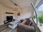 Wohnzimmer - Ferienwohnung Ostwind Neßmersiel - Top-Hundeurlaub