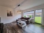 Wohnzimmer - Ferienwohnung Ostwind Neßmersiel - Top-Hundeurlaub