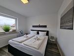 Schlafzimmer - Ferienwohnung Ostwind Neßmersiel - Top-Hundeurlaub