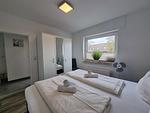 Schlafzimmer - Ferienwohnung Ostwind Neßmersiel - Top-Hundeurlaub