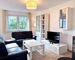 Wohnzimmer - Moderne Haushälfte mit drei Schlafzimmern und Kamin - Top-Hundeurlaub