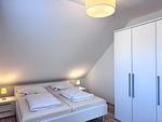 Schlafzimmer - Charmantes Ferienapartment mit Kamin - Top-Hundeurlaub