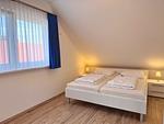 Schlafzimmer - Charmantes Ferienapartment mit Kamin - Top-Hundeurlaub