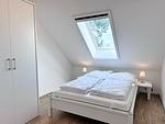 Schlafzimmer - Charmantes Ferienapartment mit Kamin - Top-Hundeurlaub