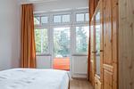 Schlafzimmer mit Doppelbett - Wohnung 02 - Top-Hundeurlaub