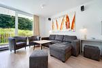 Wohnzimmer mit Sofa - Wohnung 01 - Top-Hundeurlaub