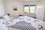 Schlafzimmer - Apartment Deichblick - Top-Hundeurlaub