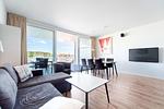 Wohnbereich mit Blick zum Balkon - Wohnung 20 - Passathafen Ostseebrise - Top-Hundeurlaub