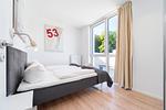 erstes Schlafzimmer mit Doppelbett - Wohnung 20 - Passathafen Ostseebrise - Top-Hundeurlaub