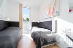 zweites Schlafzimmer mit Einzelbetten - Wohnung 20 - Passathafen Ostseebrise - Top-Hundeurlaub