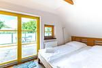 Gemütliches Schlafzimmer mit Terrassenzugang - Haus Traudi - Top-Hundeurlaub