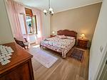 großes Schlafzimmer mit großem Doppelbett - Giardino - Top-Hundeurlaub