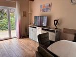Wohn-Essbereich mit Flatscreen-TV im wrho12, Haus Lea in Wremen - In der Hofe 12 - Haus Lea - Top-Hundeurlaub