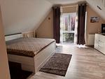 Schlafzimmer mit Doppelbett im wrho12, Haus Lea in Wremen - In der Hofe 12 - Haus Lea - Top-Hundeurlaub