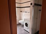 Schlafzimmer mit Waschmaschine im wrho12, Haus Lea in Wremen - In der Hofe 12 - Haus Lea - Top-Hundeurlaub