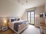 Schlafzimmer - Luxus Reetdachvilla mit 3 Schlafzimmern, Sauna und Kamin (E20) - Top-Hundeurlaub