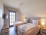 Schlafzimmer - Luxus Reetdachvilla mit 3 Schlafzimmern, Sauna und Kamin (E20) - Top-Hundeurlaub