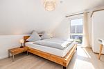 Schlafzimmer - Ferienhaus Stangenberg Bucht - Top-Hundeurlaub