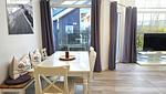 Wohnzimmer - Ferienhaus "Rachel III" im Ferienpark Holm an der Ostsee - Top-Hundeurlaub