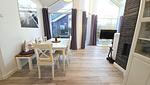 Wohnzimmer - Ferienhaus "Rachel III" im Ferienpark Holm an der Ostsee - Top-Hundeurlaub