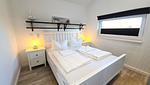 Schlafzimmer - Ferienhaus "Rachel III" im Ferienpark Holm an der Ostsee - Top-Hundeurlaub