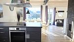 Wohnzimmer - Ferienhaus "Marie II" ostseenah im Ferienpark Holm - Top-Hundeurlaub