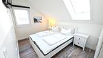 Schlafzimmer - Ferienhaus "Marie II" ostseenah im Ferienpark Holm - Top-Hundeurlaub