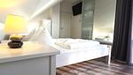 Schlafzimmer - Ferienhaus "Marie II" ostseenah im Ferienpark Holm - Top-Hundeurlaub